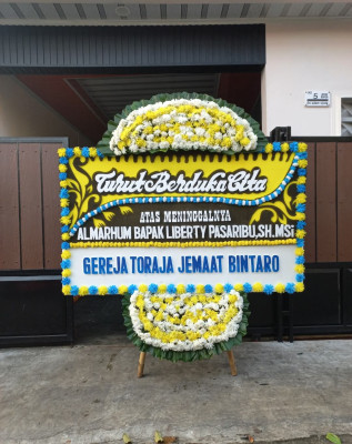 Papan Bunga Duka di Kampung Rakyat